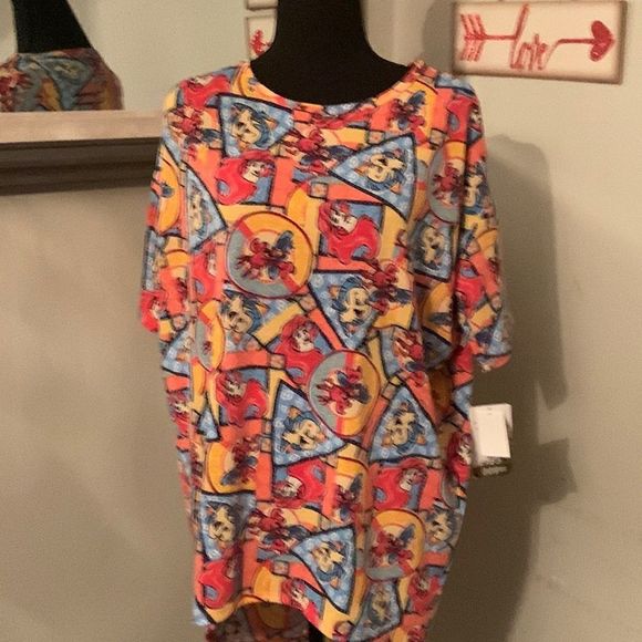 LuLaRoe Tops - NWT LuLaRoe  High low short sleeve shirt size XS